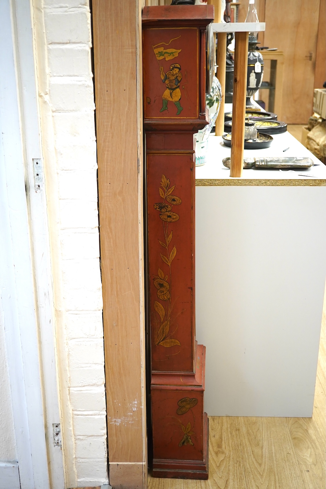 A 1930's Japanned grandmother clock with Roman numeral dial. Condition - poor, cracked and chipped